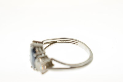 Lot 11 - Sapphire and diamond 18ct white gold three-stone ring