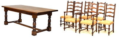 Lot 614 - Oak refectory table and six chairs