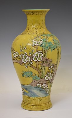 Lot 413 - Large Chinese relief-moulded sancai-glazed baluster vase