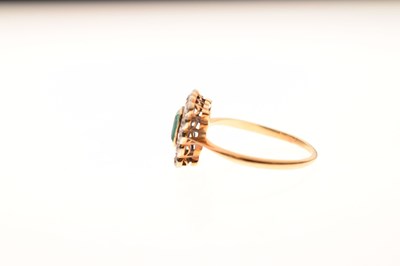 Lot 18 - Emerald and diamond 18ct yellow gold cluster ring