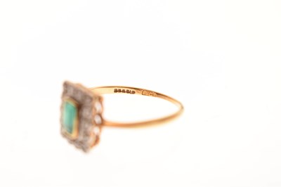 Lot 18 - Emerald and diamond 18ct yellow gold cluster ring