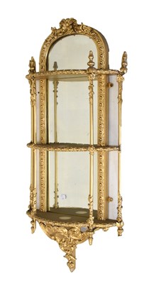 Lot 558 - Gilt mirror back wall shelf
