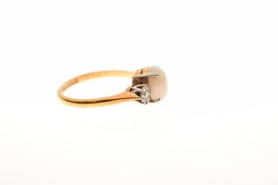 Lot 25 - Opal and diamond three-stone ring