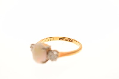 Lot 25 - Opal and diamond three-stone ring