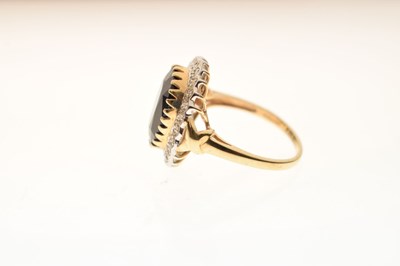 Lot 23 - 9ct gold synthetic sapphire and diamond cluster ring