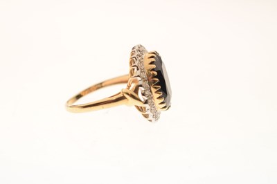 Lot 23 - 9ct gold synthetic sapphire and diamond cluster ring