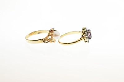 Lot 42 - Amethyst and diamond cluster ring and a cultured pearl yellow metal dress ring