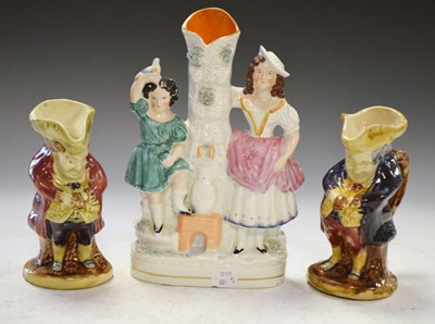 Lot 428 - Staffordshire spill vase and two jugs