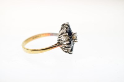 Lot 30 - Sapphire and diamond 18ct gold flower cluster ring