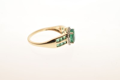 Lot 29 - Emerald and diamond 9ct gold ring