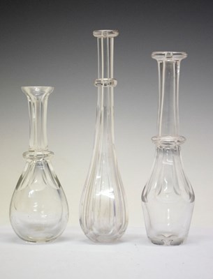 Lot 438 - Three clear glass toddy lifters