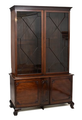 Lot 458 - George III mahogany library bookcase on cabinet