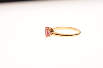 Lot 39 - Orange sapphire and diamond 18ct gold ring