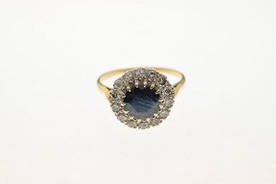 Lot 32 - 18ct gold sapphire and diamond cluster ring