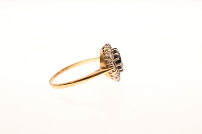 Lot 32 - 18ct gold sapphire and diamond cluster ring