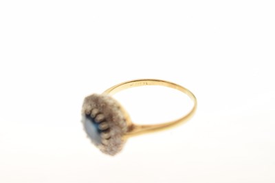 Lot 32 - 18ct gold sapphire and diamond cluster ring