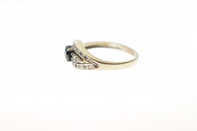 Lot 33 - Sapphire and diamond dress ring
