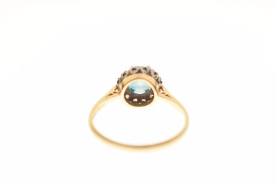 Lot 37 - Blue topaz-coloured stone and diamond cluster 18ct gold ring