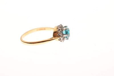 Lot 37 - Blue topaz-coloured stone and diamond cluster 18ct gold ring