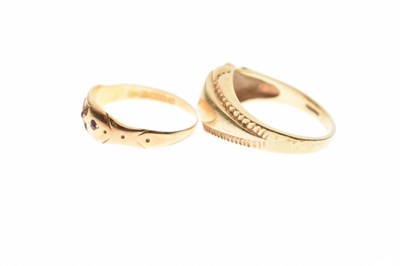 Lot 84 - 9ct gold gypsy set garnet ring
