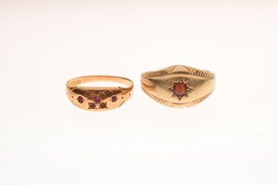 Lot 84 - 9ct gold gypsy set garnet ring