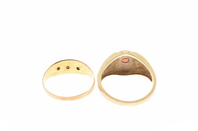 Lot 84 - 9ct gold gypsy set garnet ring