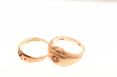 Lot 84 - 9ct gold gypsy set garnet ring