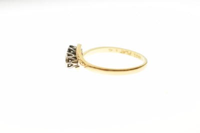 Lot 15 - Two-stone crossover illusion set diamond ring