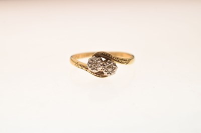 Lot 15 - Two-stone crossover illusion set diamond ring