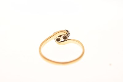 Lot 15 - Two-stone crossover illusion set diamond ring