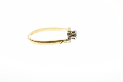 Lot 15 - Two-stone crossover illusion set diamond ring