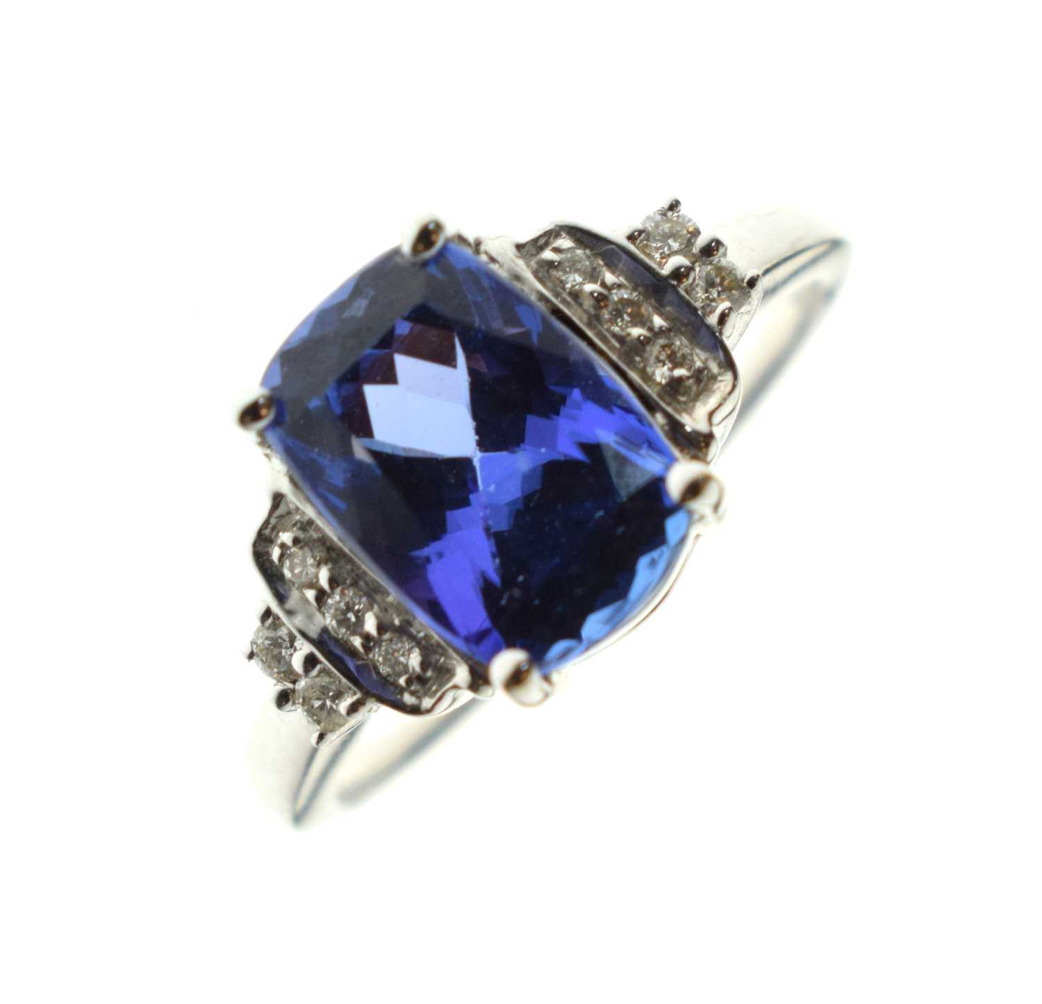 Lot 15 - Tanzanite and diamond 18ct white gold ring