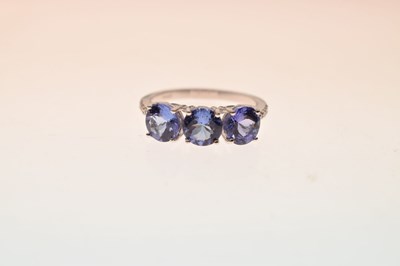 Lot 57 - 18ct white gold, three tanzanite ring