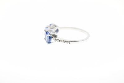 Lot 57 - 18ct white gold, three tanzanite ring