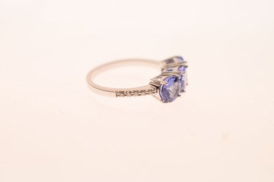 Lot 57 - 18ct white gold, three tanzanite ring