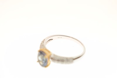Lot 54 - 18ct white gold 'Chameleon' tanzanite and diamond ring