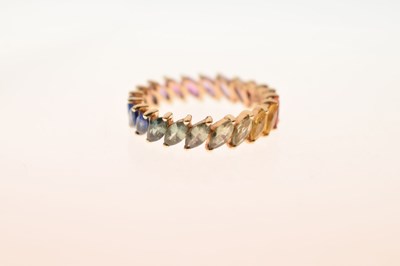 Lot 55 - 9K yellow metal and fancy sapphire full eternity ring