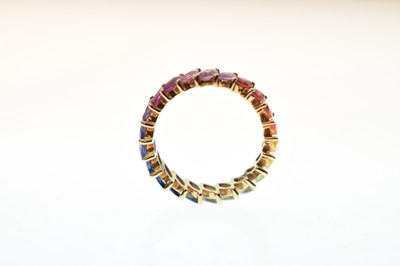 Lot 55 - 9K yellow metal and fancy sapphire full eternity ring