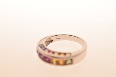 Lot 35 - Fancy-coloured sapphire 9ct white gold dress ring