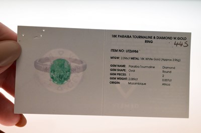 Lot 30 - Paraiba tourmaline and diamond 18ct white gold dress ring