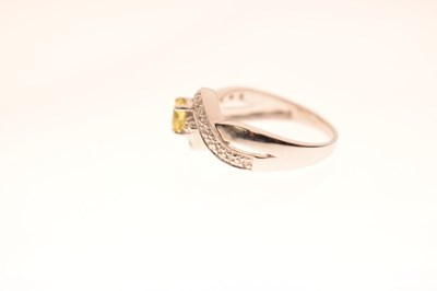 Lot 61 - 18ct white gold, yellow and white diamond ring