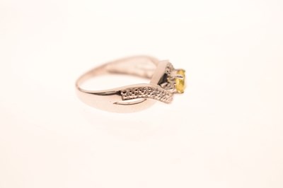 Lot 61 - 18ct white gold, yellow and white diamond ring