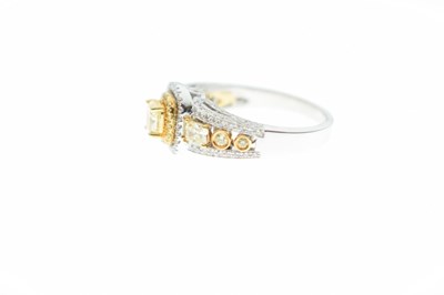 Lot 62 - 18ct white gold, yellow and white diamond ring