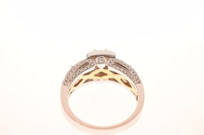 Lot 62 - 18ct white gold, yellow and white diamond ring