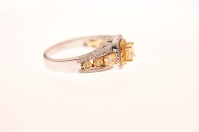 Lot 62 - 18ct white gold, yellow and white diamond ring