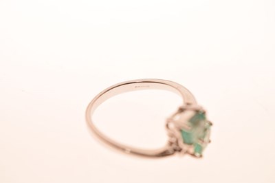 Lot 64 - 9ct white gold, Siberian emerald and diamond crossover ring