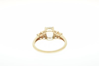 Lot 93 - Three gem-set 9ct gold dress rings