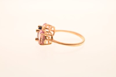 Lot 67 - Three-stone sapphire and diamond 9ct gold dress ring
