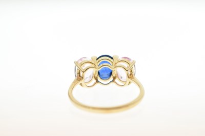 Lot 67 - Three-stone sapphire and diamond 9ct gold dress ring
