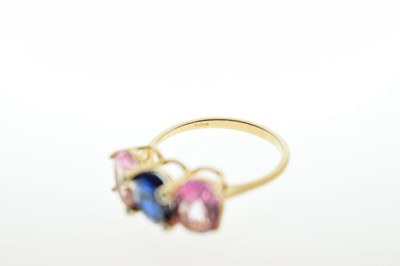 Lot 67 - Three-stone sapphire and diamond 9ct gold dress ring